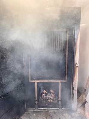 devon eels hanging in a smoker